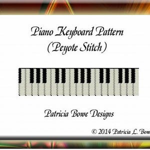 May include: A digital piano keyboard pattern in a peyote stitch design. The pattern features a series of black and white keys, with the text "Piano Keyboard Pattern (Peyote Stitch)" above the keys. The design is by Patricia Bowe Designs.