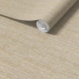 May include: A roll of beige wallpaper with a woven texture. The wallpaper is a neutral color, with a subtle pattern that resembles linen or burlap. The roll is partially unrolled, revealing the paper's thickness and texture.