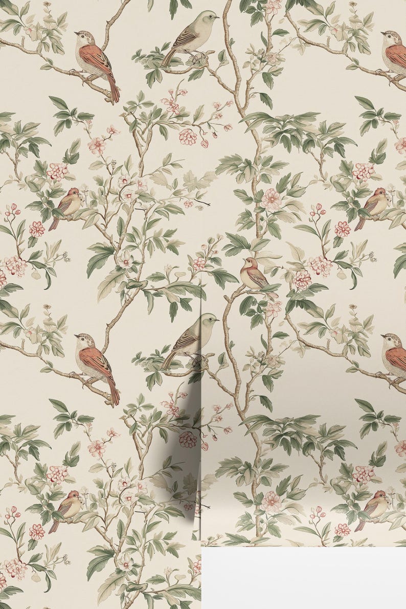 May include: A beige wallpaper with a repeating pattern of delicate green branches, pink flowers, and brown birds. The birds are perched on the branches and have a light brown body with a darker brown head and tail.