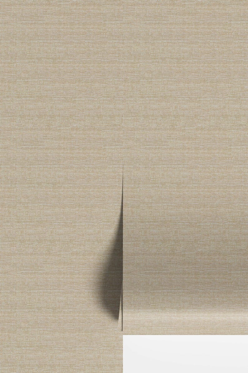 May include: Beige textured wallpaper with a subtle woven pattern. The wallpaper is partially unrolled, revealing a white edge and a dark shadow. The overall effect is a neutral, natural aesthetic, suitable for interior design.