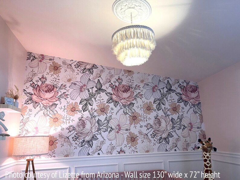 May include: A white floral wallpaper with pink and yellow flowers. The wallpaper is on a wall that is 130 inches wide and 72 inches high.