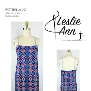 May include: A blue and pink patterned sleeveless dress with a scoop neck and thin straps. The dress is on a white mannequin. The text "PATTERN LA-007" and "SIZES INCLUDED: XS,S,M,L,XL,XXL" is at the top of the image. The text "Leslie Ann" is at the top right of the image. The text "©2020 ROBERT JOSEPH APPAREL, LLC" is below the logo. The text "Leslie Ann" is at the bottom right of the image.