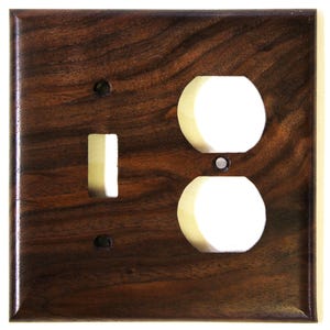 May include: A rustic wooden sign with the text "Welcome to our home" in a handwritten style. The sign has a distressed finish and a simple, inviting design, suitable for a front porch or entryway.