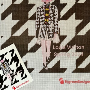 May include: A black and white houndstooth pattern with a fashion illustration of a woman wearing a black and white houndstooth jacket, a white skirt, and black shoes. The text "Louis Vuitton Spring 2024" is at the bottom of the image.