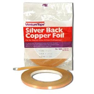 May include: A roll of VentureTape Silver Back Copper Foil in a clear plastic bag. The packaging features red and purple text reading Silver Back Copper Foil, No. 1665-1.5 mil, 1/4 inch x 36 yards, and 6.35 mm x 33m. A copper tape roll sits in front.