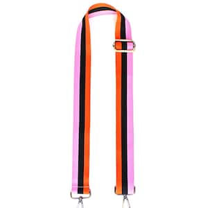 May include: A colorful bag strap with a pink base, black and orange stripes, and gold-tone hardware. The strap features metal swivel hooks and an adjustable buckle for length customization.