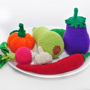 Crochet pumpkin pattern, crochet eggplant pattern, crochet radish pattern, crochet hot chili pepper patterns, crochet garlic pattern. Crochet fruit and vegetables patterns. Perfect patterns for kids play kitchen