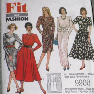 May include: A vintage sewing pattern titled "Fit and Fashion" featuring illustrations of five different dresses. The dresses include a plaid dress, a red dress, a paisley print dress, a light-colored dress with a bow, and a black and white patterned dress.