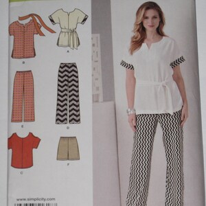 May include: Simplicity easy-to-sew pattern featuring a woman wearing a white top with black and white chevron pants. The pattern includes illustrations of various tops, pants, and shorts. The pattern size is XXS-XXL.
