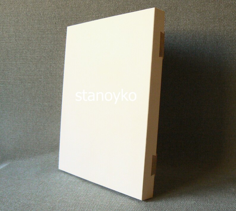 May include: A white rectangular blank canvas with the word "stanoyko" printed in the center.