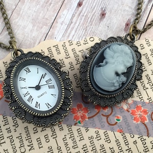 Victorian Style Cameo Pocketwatch Necklace Black & White Cameo Setting Round Bronze Pocket Watch Necklace CHAIN and BATTERY INCLUDED 010