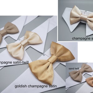 May include: Four bow ties in different colors and textures: sand twill, champagne satin-twill,  goldish champagne satin, and champagne satin.