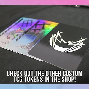May include: Three custom TCG tokens are displayed. Two have holographic backgrounds with Japanese text and character illustrations. The third token is black with a white abstract design. Text at the bottom reads: CHECK OUT THE OTHER CUSTOM TCG TOKENS IN THE SHOP!