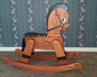 painted wooden rocking horse