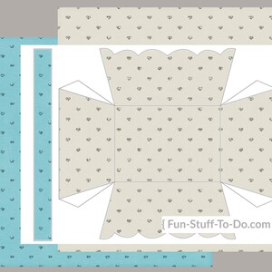 Op de afbeelding: Printbare sjabloon voor een kleine doos met een gegolfde bovenkant. De doos is versierd met een patroon van kleine zilveren hartjes op een beige achtergrond. De sjabloon bevat flappen om in elkaar te zetten. De tekst "Fun-Stuff-To-Do.com" staat onderaan de doos gedrukt.