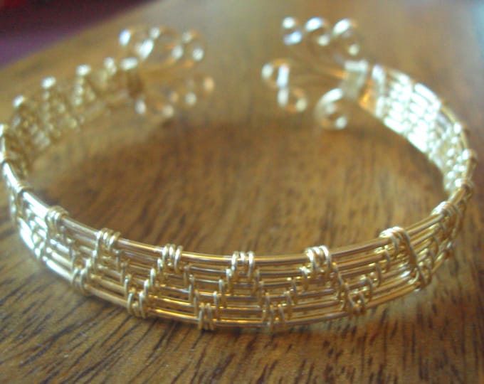 Beautiful gold plated semi precious copper wire wrapped cuff bangle.
