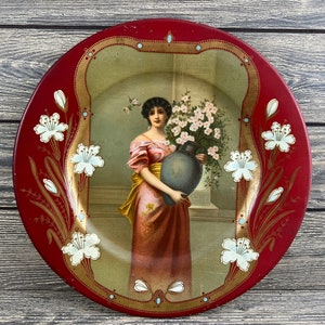 Antique 1900&#39;s Vienna Art Plates Woman w/Vase 10&quot; Tin