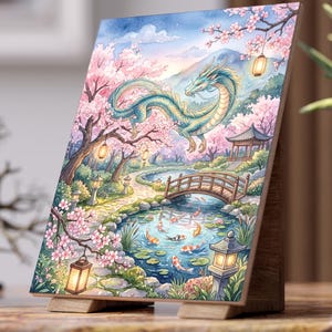 May include: A wooden art print featuring a serene Japanese garden scene with a turquoise dragon soaring above a pond filled with koi fish. Cherry blossoms in pink and white frame the landscape, with a wooden bridge and traditional lanterns.