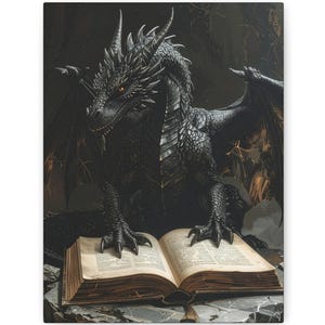 May include: A canvas print featuring a detailed illustration of a black dragon with orange eyes. The dragon is seated in front of an open, aged book. The artwork has a fantasy theme, with a dark, textured background.