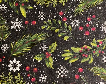 May include: A black fabric with a festive Christmas pattern. The design features green pine needles, holly leaves, red berries, and white snowflakes. The overall effect is a winter holiday theme.