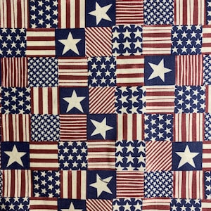 May include: A patchwork pattern featuring squares with patriotic designs. The squares display white stars on a blue background, red and white stripes, and fields of white stars. The overall color scheme is red, white, and blue.