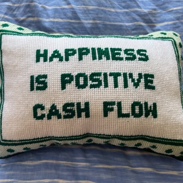 Custom Needlepoint Decorative Pillow with humorous saying "Happiness is positive cash flow"