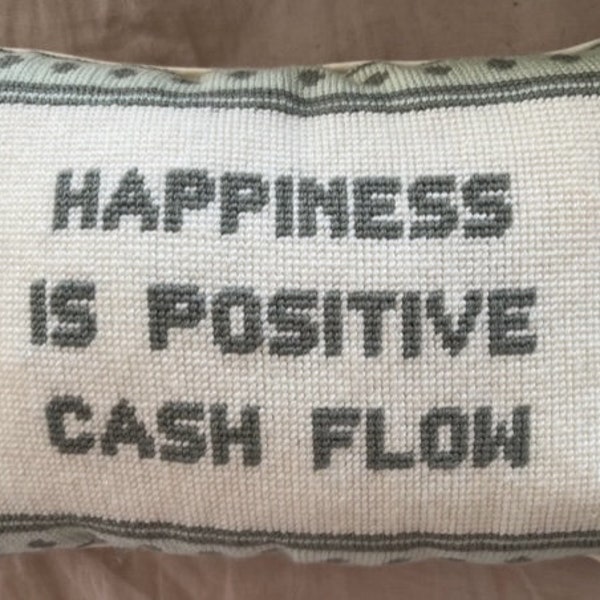 Coussin décoratif personnalisé au point d'aiguille avec dicton humoristique « Le bonheur, c'est un flux de trésorerie positif »