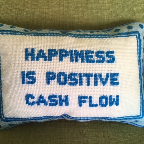 Custom Needlepoint Decorative Pillow with humorous saying "Happiness is positive cash flow"