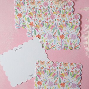 May include: Scalloped-edge stationery with a colorful floral and bird pattern. The design includes rainbow-colored birds, flowers, and leaves on a white background. One card has the text "from me to you".