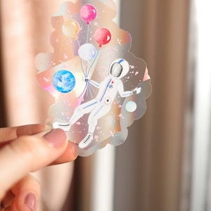 sun catcher sticker, sun catcher window, astronaut sticker, rainbow maker window sticker, rainbow maker decal, rainbow maker suncatcher