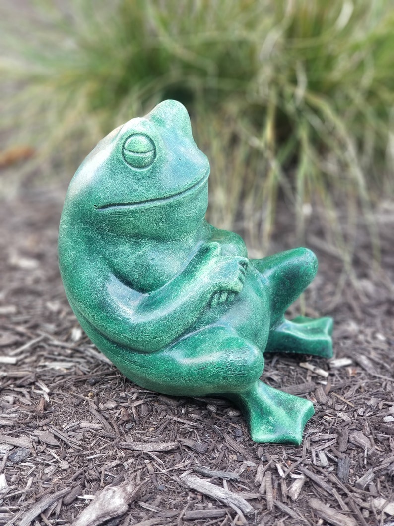 relaxing frog statue