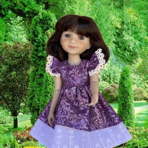 May include: A purple dress with a white lace trim and a floral pattern. The dress is worn by a doll with brown hair and blue eyes. The doll is standing in a garden setting.