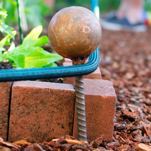 Garden Hose Stake Guides Set of 4 with Spiked Rebar Stakes 3in Diameter Steel Gazing Balls Rusted Patina Finish image 3