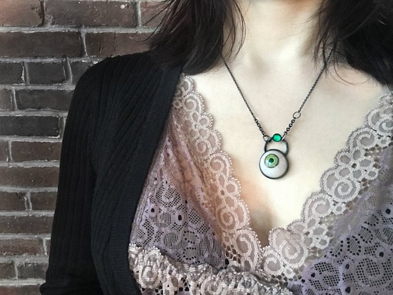 Prosthetic eye deals jewelry