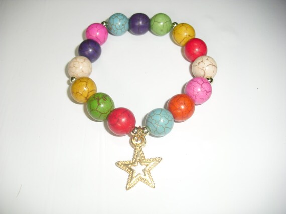 Items similar to Bella pulsera elegante y colorida con dije de Estrella ...