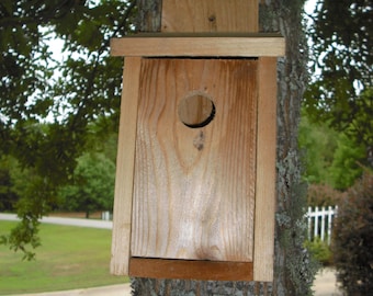 Spring Special:  Cedar bird house for blue birds and wrens, with clean out panel