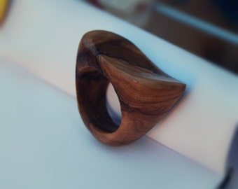 Curve. A Greek Olivewood ring