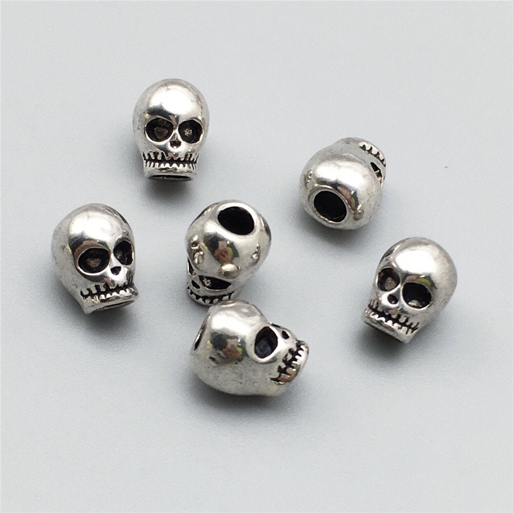30pcs/lot skull beads,silver color one-eye skull shaped beads 30pcs/lot skull beads,silver color one-eye skull shaped beads