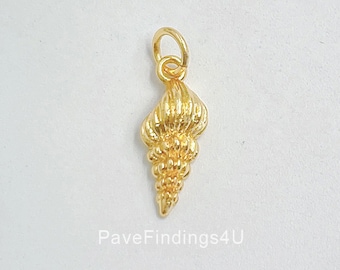 May include: Gold-toned seashell charm with a detailed, textured design. The charm has a loop at the top for attaching to jewellery.