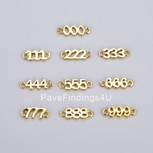 May include: Ten gold-tone metal number charms, each featuring a different number from 0 to 9. The charms are in the shape of the numbers and have a loop on each end for attaching to jewelry or other crafts.