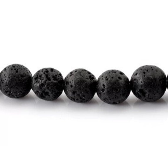 10 Cuentas Redondas Fondo Negro Carita Blanca 10mm B – Las Dalinas Insumos