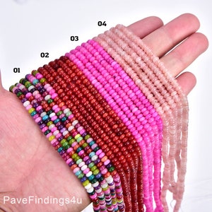 May include: Assortment of 4 strands of pink, red, and multi-colored beads. The beads are small and round. The strands are labeled 01, 02, 03, and 04.