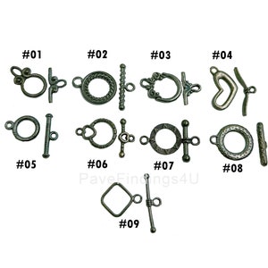 May include: Nine different styles of silver-toned metal clasps or toggles for jewelry making. Each clasp is numbered from 1 to 9.