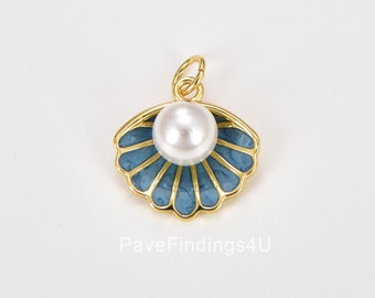 May include: Gold-tone seashell charm with a white pearl in the center. The seashell is blue with gold accents.