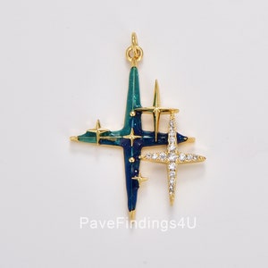 May include: Gold-tone pendant featuring a blue and green enamel starburst design with smaller stars and clear cubic zirconia accents.