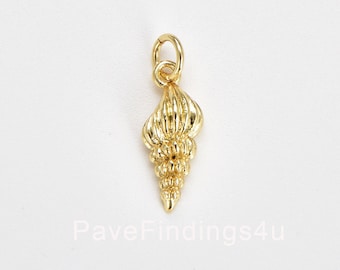 May include: Gold-toned seashell charm with a detailed, textured design. The charm has a loop at the top for attaching to jewellery.