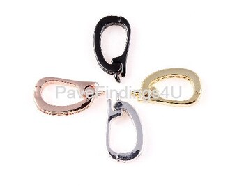 May include: Four different colored metal clasps for jewelry making. The clasps are in black, gold, silver, and rose gold.