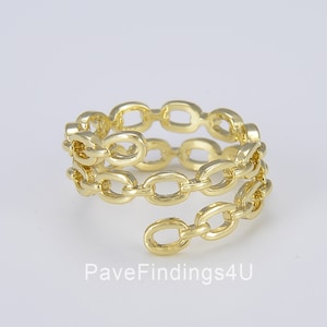 May include: Gold chain ring with a double row of oval links. The ring is open and adjustable to fit most finger sizes.