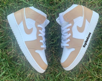 pink white and tan jordans