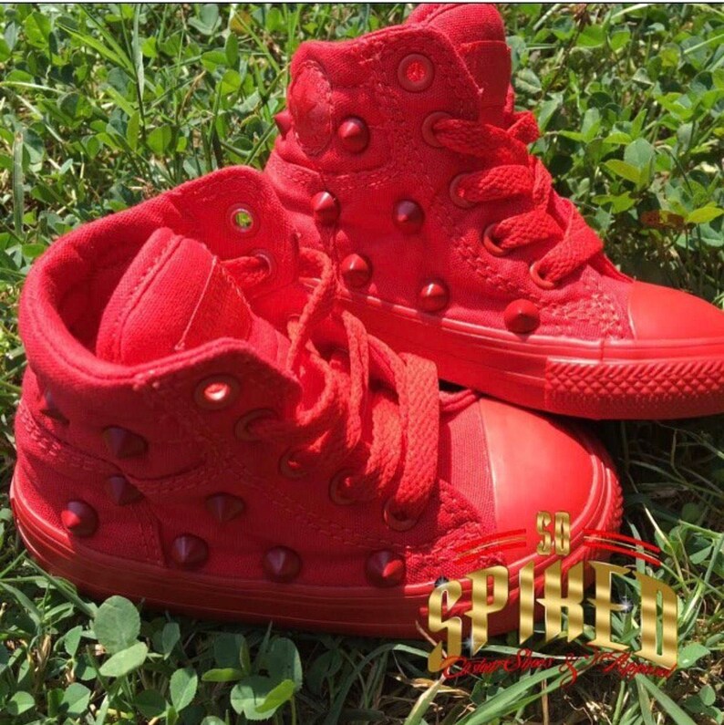 red studded converse